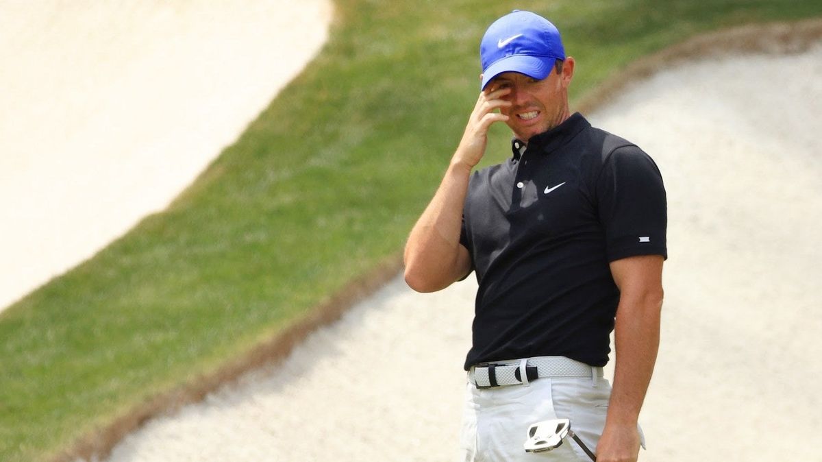 Rory McIlroy reacts after missing a putt on the 13th green during the first round of the Masters at Augusta National Golf Club.