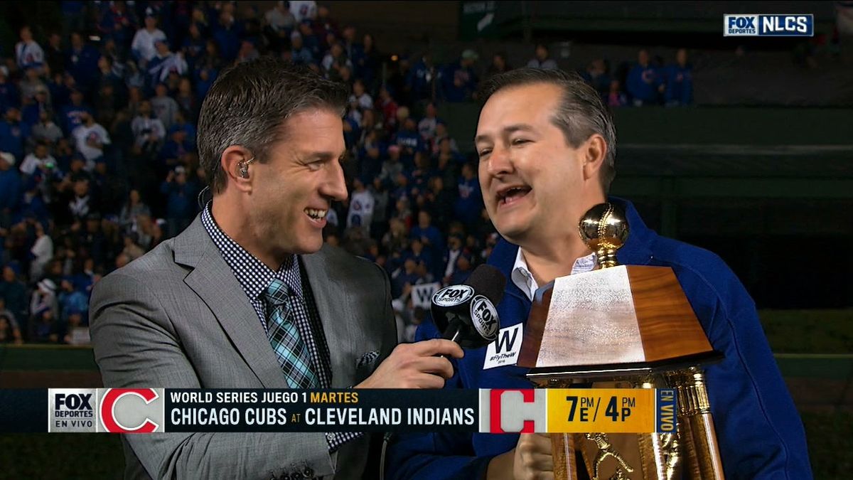 Cubs owner Tom Ricketts with Kevin Burkhardt of FOX.