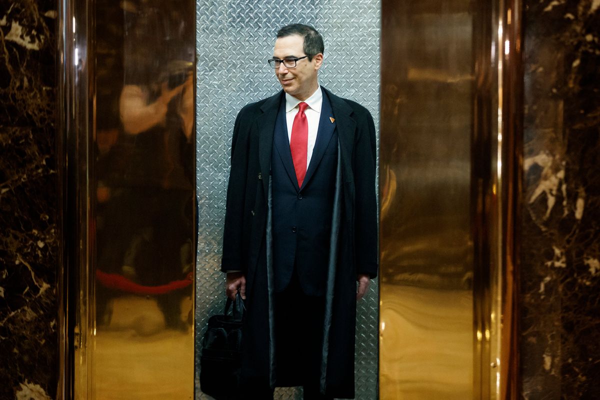 Photo of a Goldman Sachs guy ascending a golden elevator: [object Object]