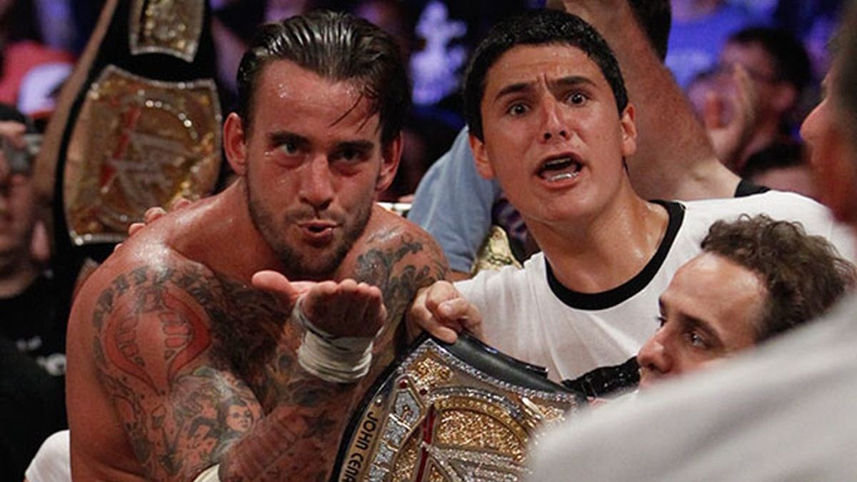 CM Punk blows Vince McMahon a kiss at Money in the Bank 2011.