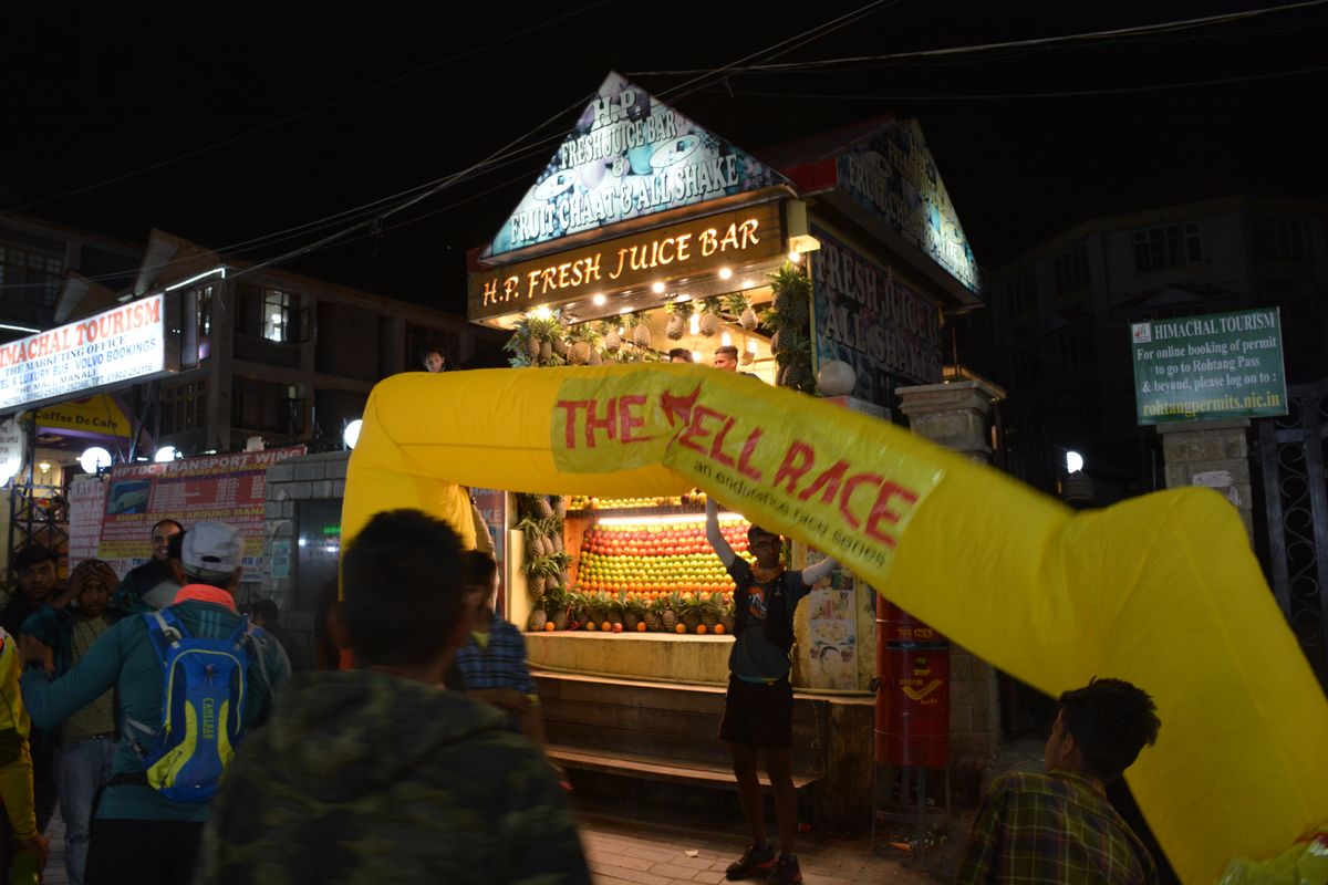 Volunteers set up the starting line in Manali