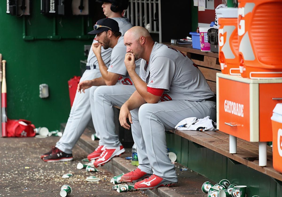 Pitcher Jonathan Broxton sits in the dugout after being pulled in the seventh inning of another Cardinals loss. Via  [object Object] .