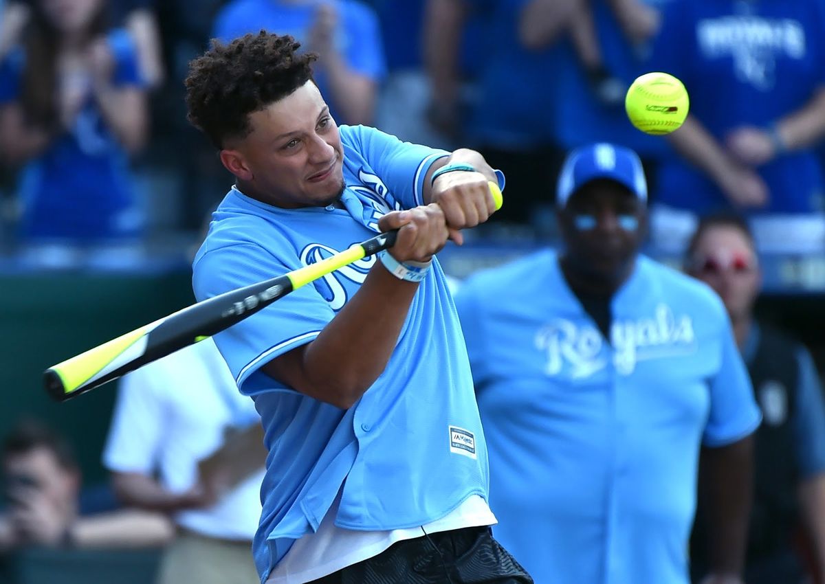 Patrick Mahomes takes a swing in a celebrity softball game at Kauffman Stadium last season.