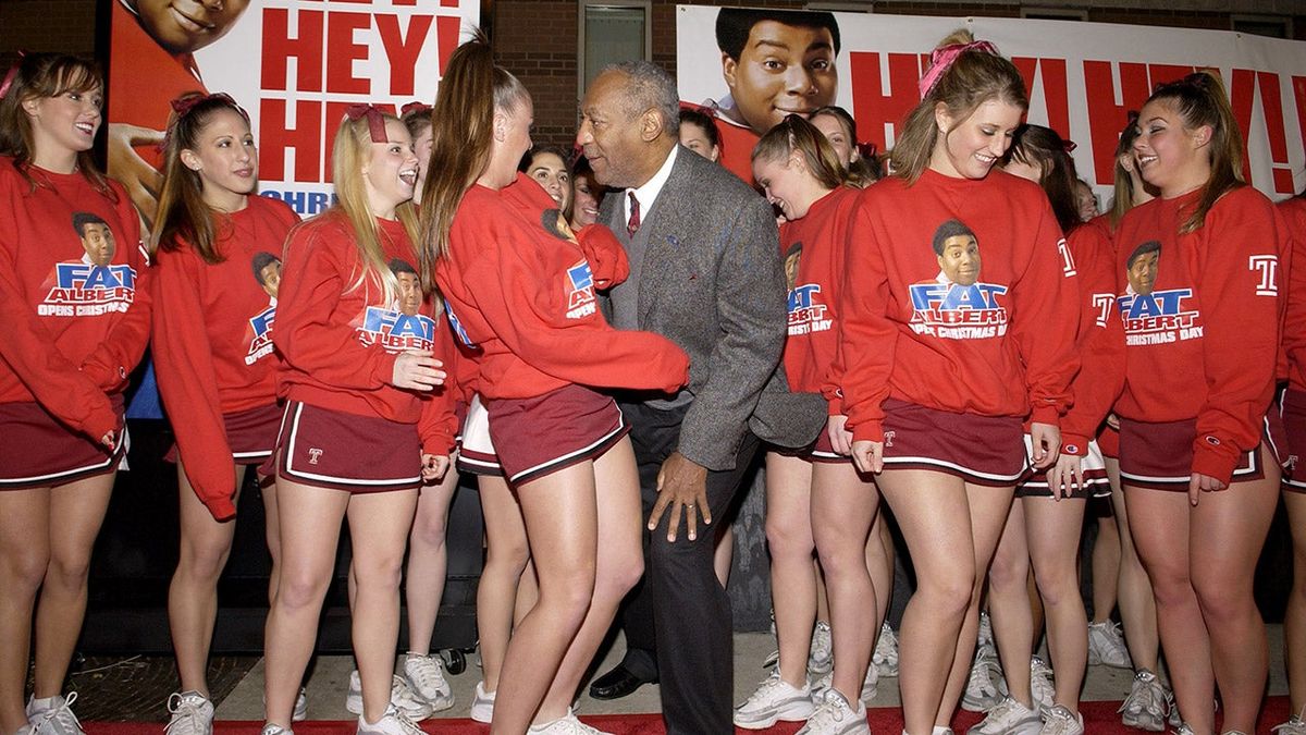 Bill Cosby with Temple cheerleaders at the premiere of Fat Albert in December 2004.