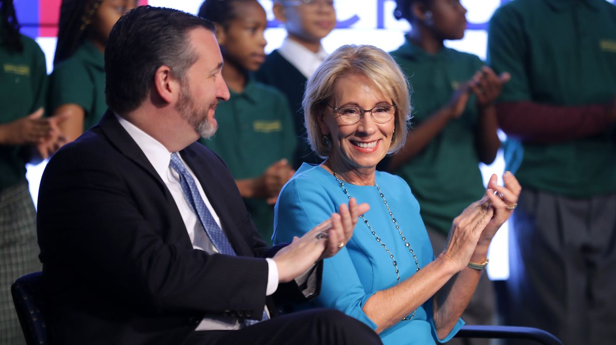 Betsy DeVos (r.) thirsts eternally for a conversation with your supervisor. The poltergeist to her left, Texas Sen. Ted Cruz, is unrelated to this story.