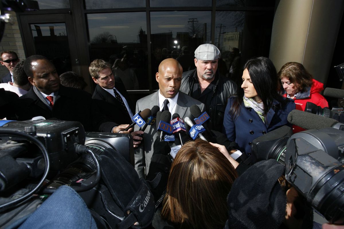 Shaun Gayle talks with reporters after a bond hearing for Marni Yang, charged with and convicted for the murder of Rhoni Reuter.