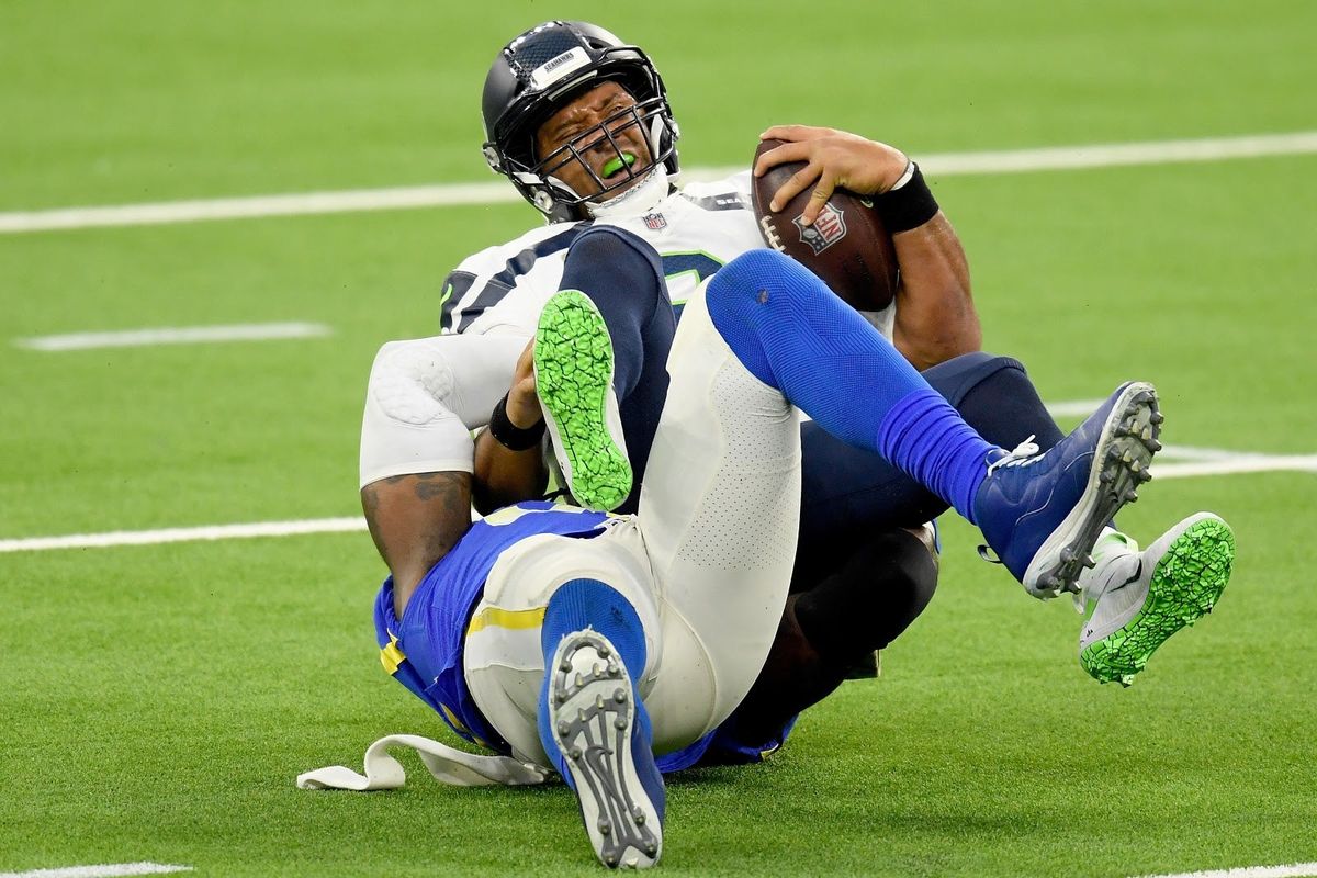 Russ goes down.
