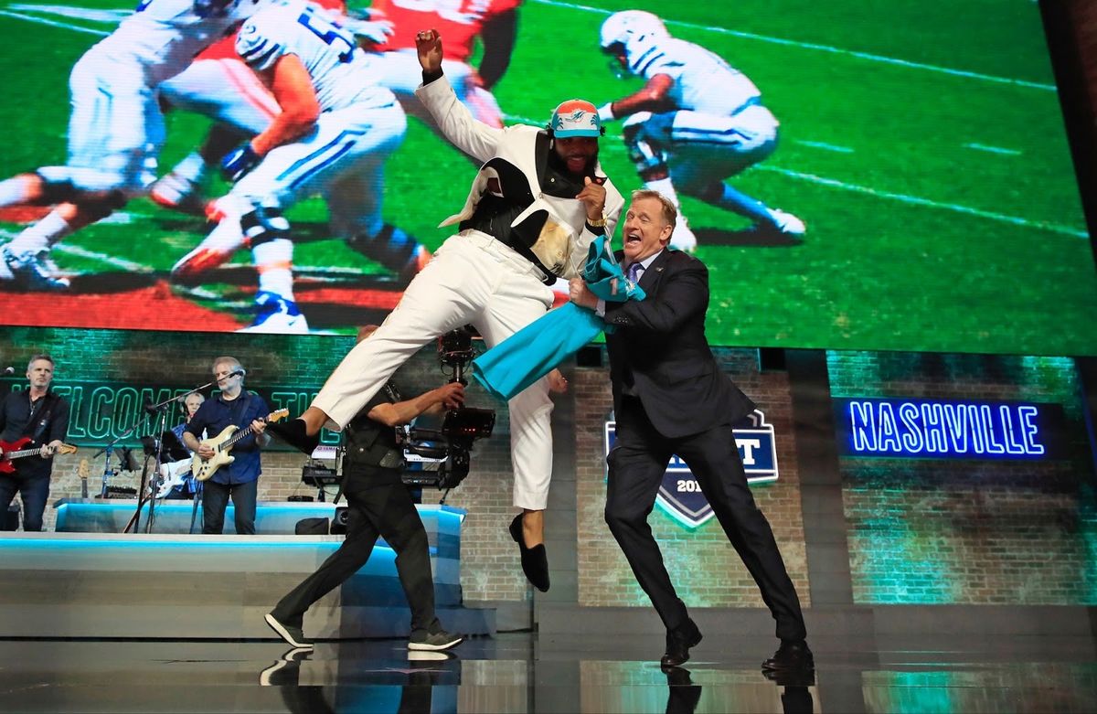 Christian Wilkins of Clemson celebrating with Roger Goodell after being chosen by the Miami Dolphins in 2019 was a fun moment. But really, let’s not.