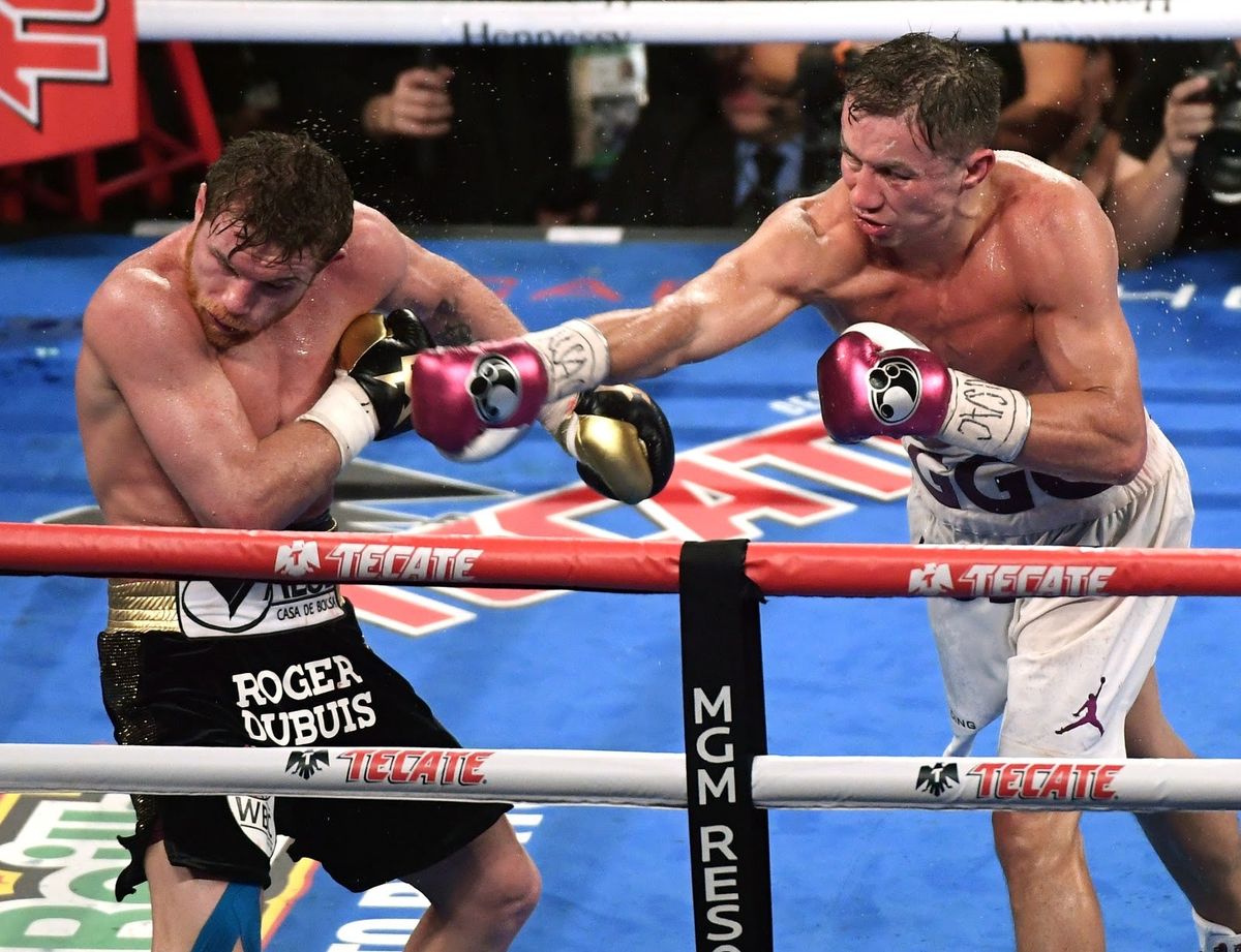 Gennadiy Golovkin hits  Saul “Canelo” Alvarez in a 2018 bout.