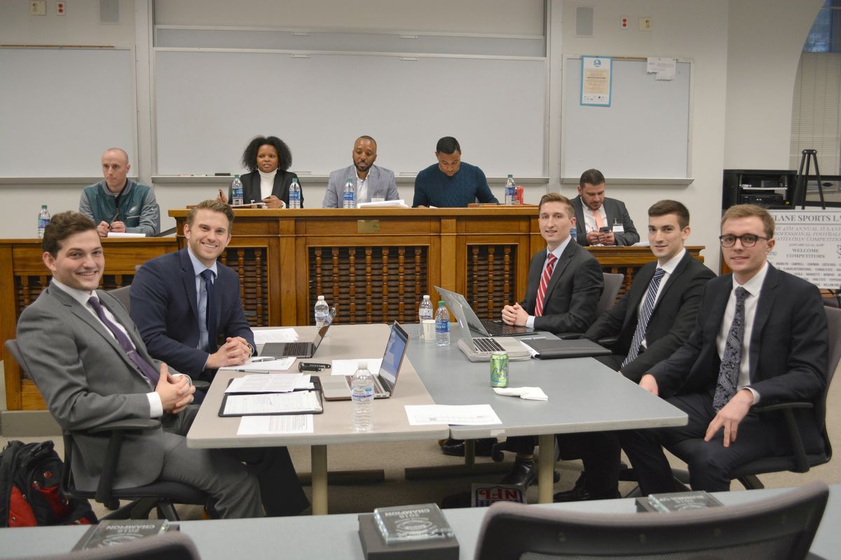 (Left to right) Chapman University’s Spencer Shain and Jared Silverstone take on Villanova University’s Tyler MacDougall, Jason Kaner, and Anthony Malky in the championship round of Tulane Sports Law’s 4th Annual Professional Football Negotiation Competition. (Alina Hernandez/Tulane University Law School)