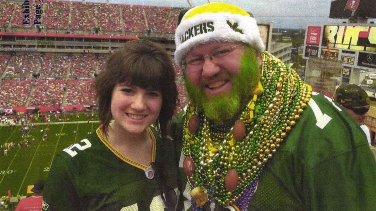 Packers fan Russell Beckman has sued the Bears for not letting him on the field in his Packers gear last season, even though he’d earned the perk as a Bears season ticket-holder. He is shown here with his daughter at a Buccaneers game, in an image submitted as part of the lawsuit.
