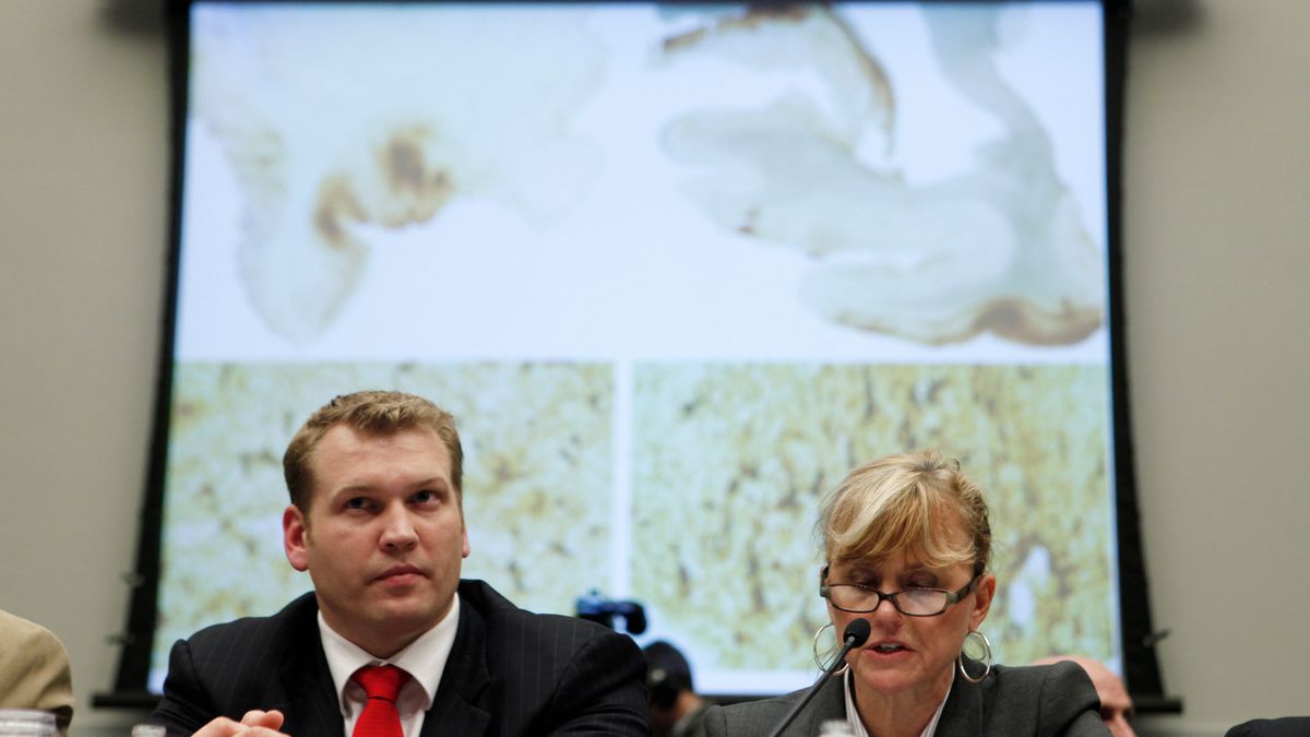 Chris Nowinski and Dr. Ann McKee at a House Judiciary Committee hearing in 2009 (photo via Charles Dharapak/ [object Object] )