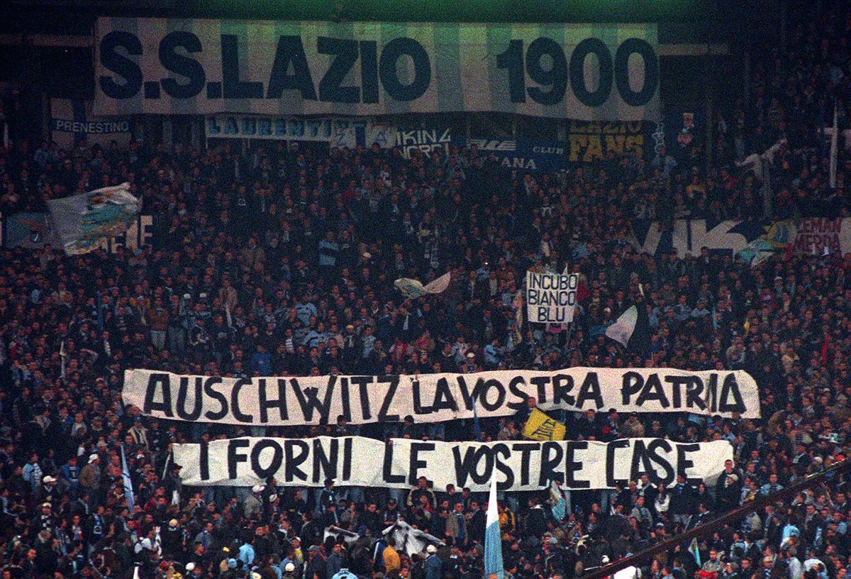 A banner from Lazio supporters in 1998, referring to archrival AS Roma: “Auschwitz is Your Homeland. The Ovens are Your Homes”