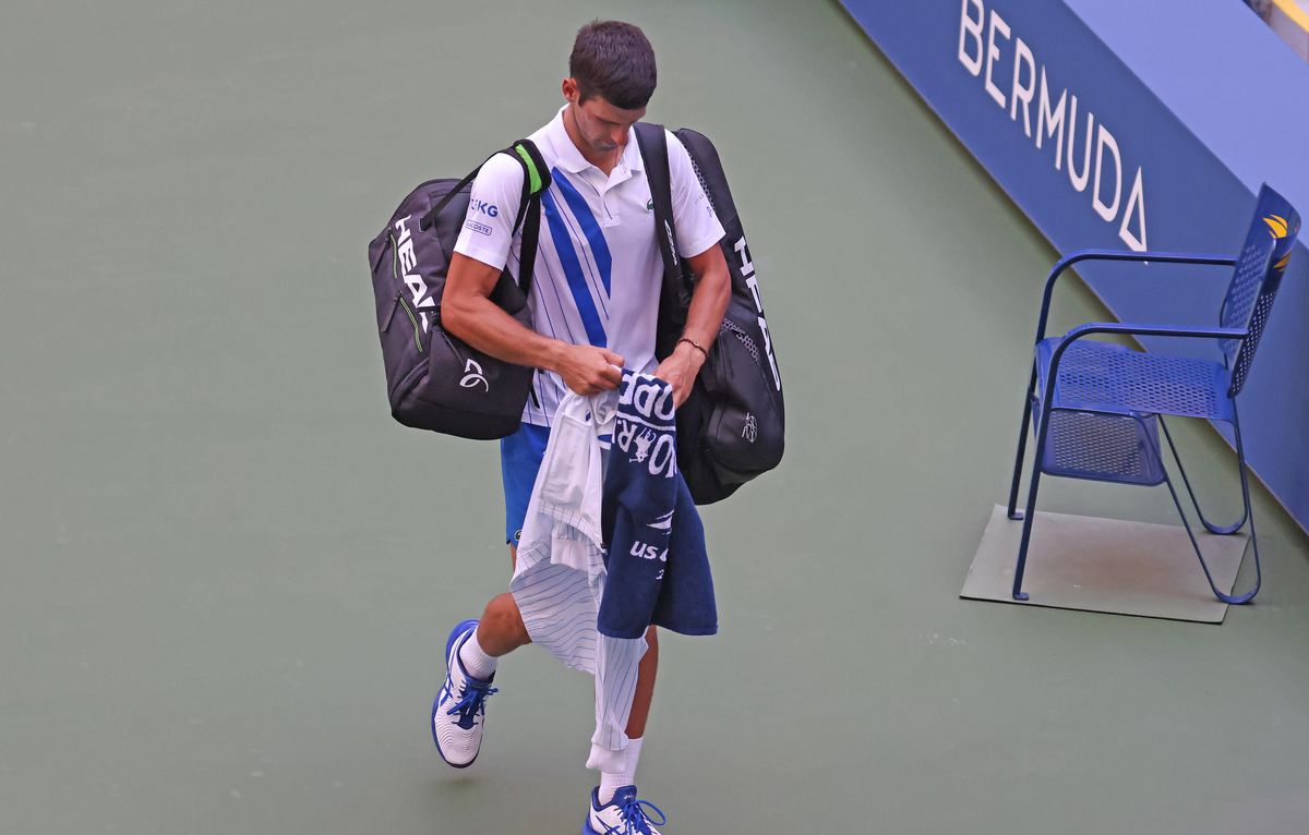 Novak Djokovic leaves the 2020 US Open after being disqualified for hitting a linesperson with a ball.