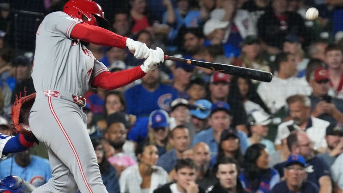  Reds blast 4 homers in victory over Cubs 