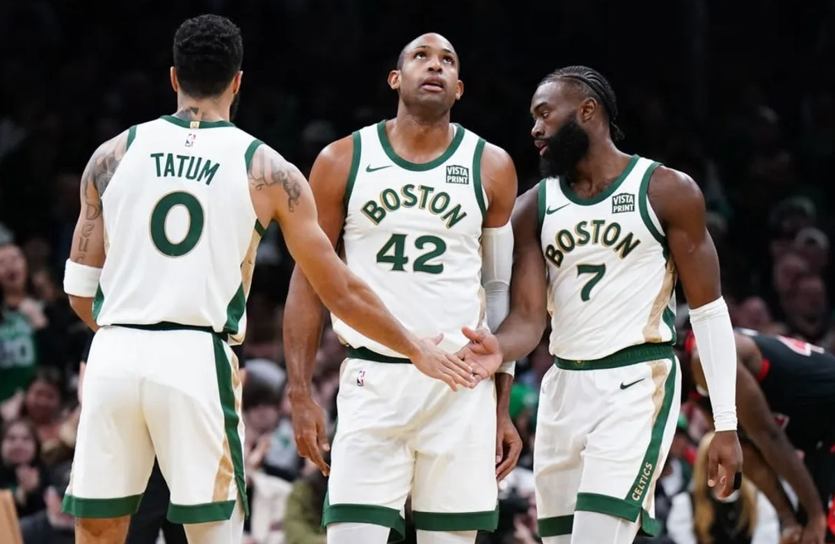 Nov 28, 2023; Boston, Massachusetts, USA; Boston Celtics guard Jaylen Brown (7) with forward Jayson Tatum (0) and center Al Horford (42) after his basket against the Chicago Bulls in the second half at TD Garden. credits: David Butler II-USA TODAY Sports