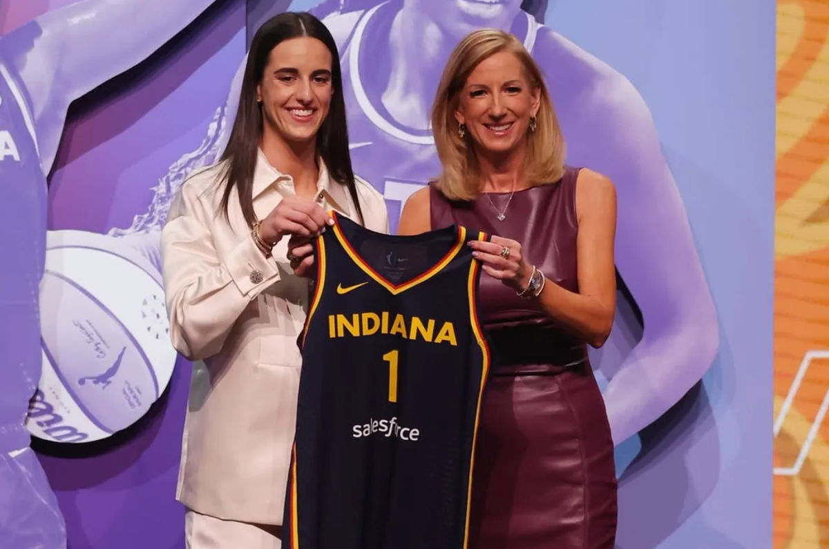 Apr 15, 2024; Brooklyn, NY, USA; Caitlin Clark poses with WNBA commissioner Cathy Engelbert after she is selected with the number one overall pick to the Indiana Fever in the 2024 WNBA Draft at Brooklyn Academy of Music. credits: Brad Penner-USA TODAY Sports