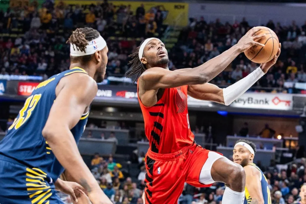 Nov 27, 2023; Indianapolis, Indiana, USA; Portland Trail Blazers forward Jerami Grant (9) shoots the ball while Indiana Pacers center Myles Turner (33) defends in the second quarter at Gainbridge Fieldhouse. credits: Trevor Ruszkowski-USA TODAY Sports