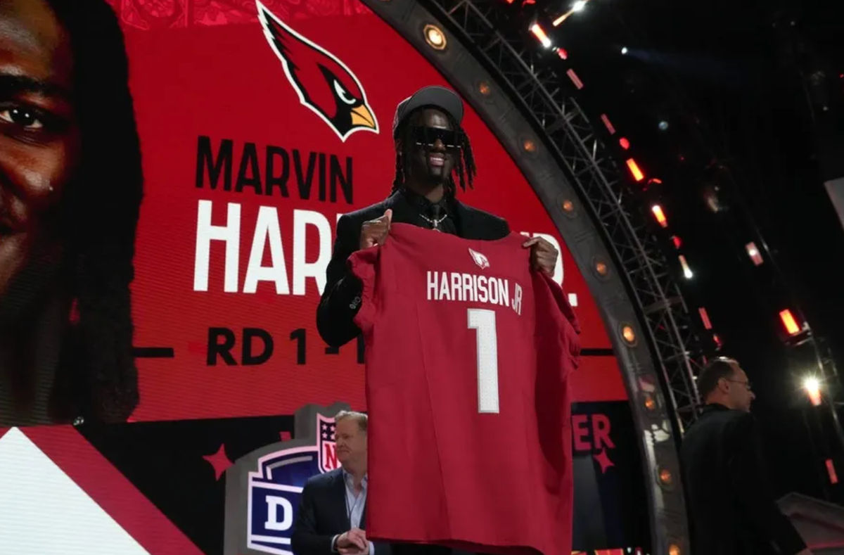 Apr 25, 2024; Detroit, MI, USA; Ohio State Buckeyes wide receiver Marvin Harrison Jr. poses after being selected by the Arizona Cardinals as the No. 4 pick in the first round of the 2024 NFL Draft at Campus Martius Park and Hart Plaza. Mandatory Credit: Kirby Lee-USA TODAY Sports