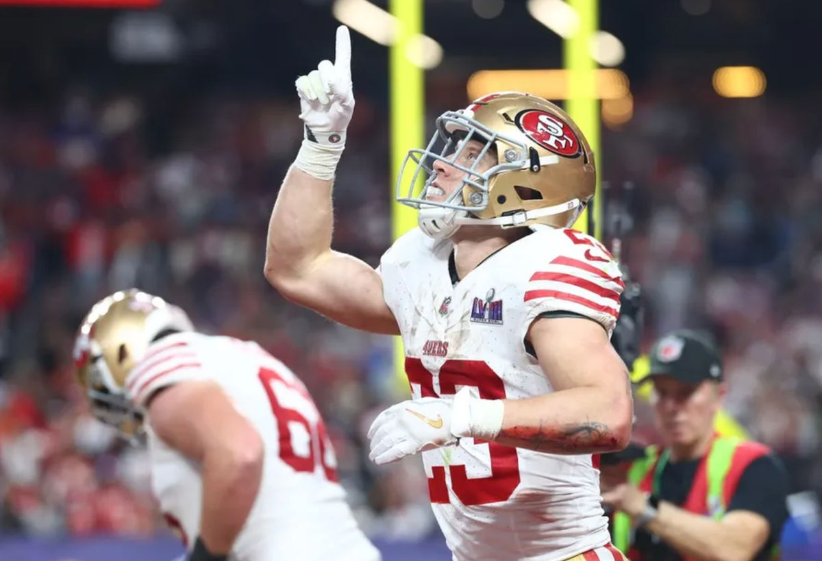 Feb 11, 2024; Paradise, Nevada, USA; San Francisco 49ers running back Christian McCaffrey (23) scores a touchdown against the Kansas City Chiefs in the first half of Super Bowl LVIII at Allegiant Stadium. Mandatory Credit: Mark J. Rebilas-USA TODAY Sports