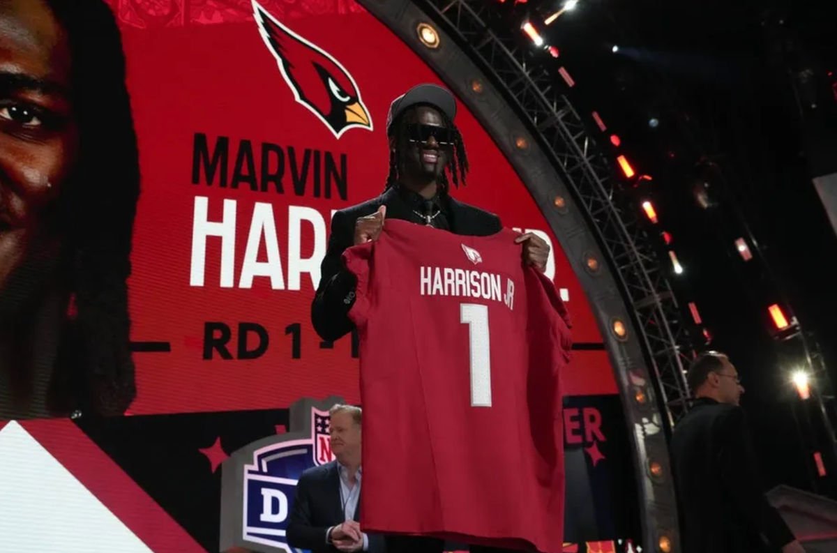 Apr 25, 2024; Detroit, MI, USA; Ohio State Buckeyes wide receiver Marvin Harrison Jr. poses after being selected by the Arizona Cardinals as the No. 4 pick in the first round of the 2024 NFL Draft at Campus Martius Park and Hart Plaza. Mandatory Credit: Kirby Lee-USA TODAY Sports