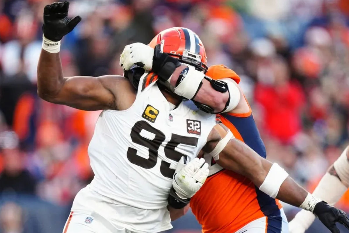 Nov 26, 2023; Denver, Colorado, USA; Denver Broncos offensive tackle Garett Bolles (72) holds Cleveland Browns defensive end Myles Garrett (95) in the second quarter at Empower Field at Mile High. credits: Ron Chenoy-USA TODAY Sports