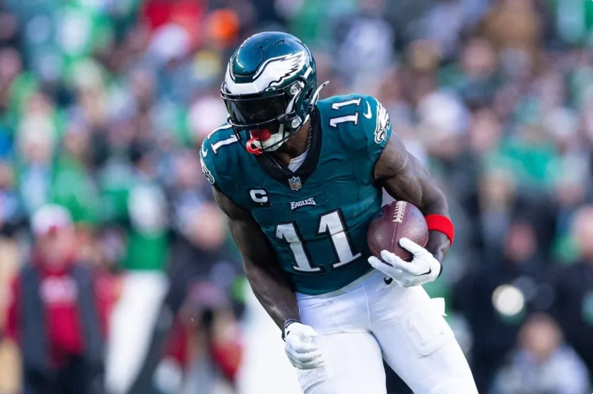 Dec 31, 2023; Philadelphia, Pennsylvania, USA; Philadelphia Eagles wide receiver A.J. Brown (11) runs with the ball during the fourth quarter against the Arizona Cardinals at Lincoln Financial Field. credits: Bill Streicher-USA TODAY Sports