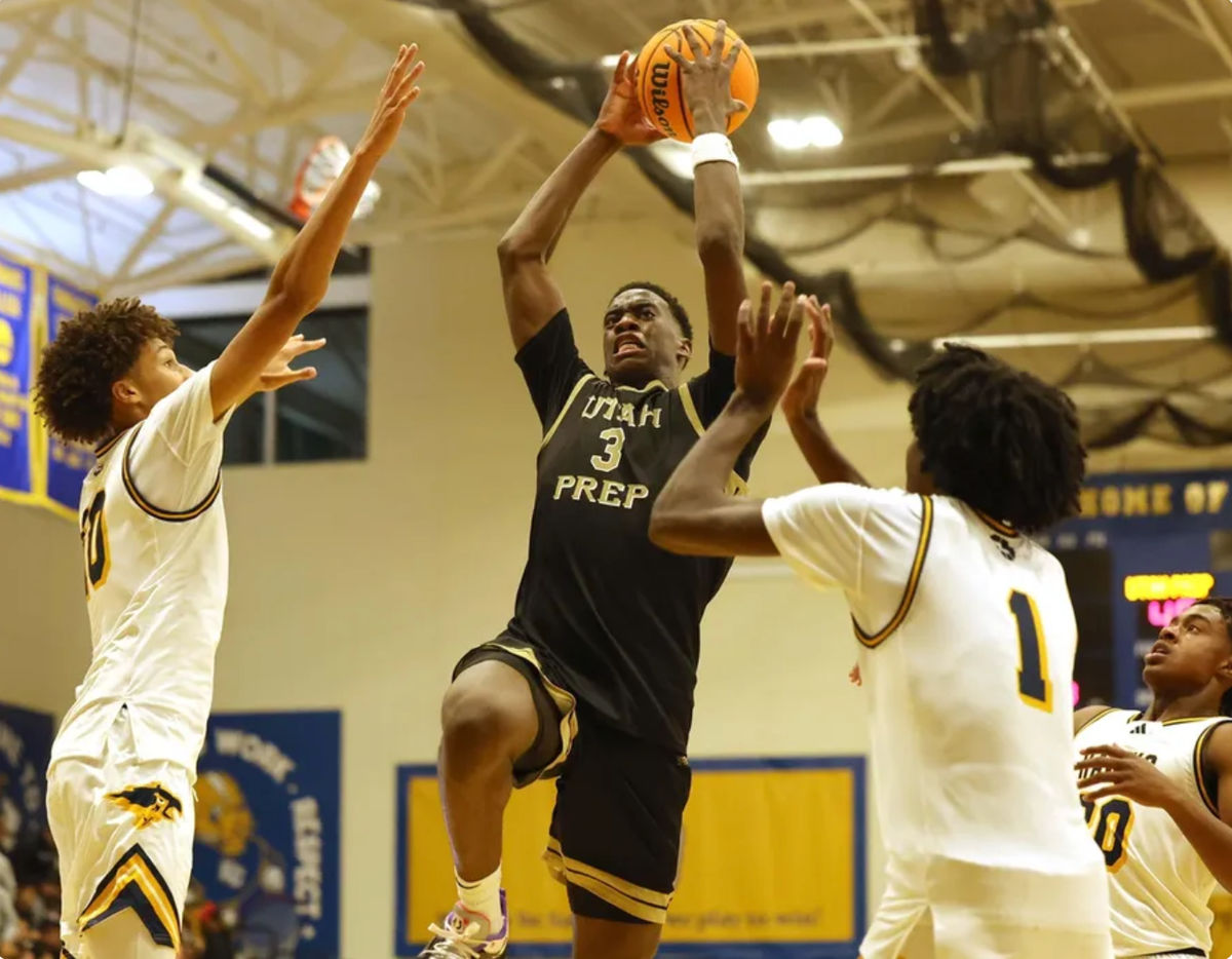 Utah Prep's AJ Dybantsa drives to the basket on Highland's Jemal Smith, left, and Josh Hamilton during a game at Emmanuel College in Boston on Tuesday, Nov. 5, 2024. PHOTO USA TODAY SPORTS IMAGES