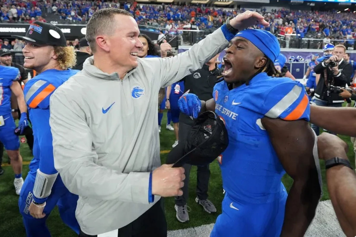 Dec 2, 2023; Las Vegas, NV, USA; Boise State Broncos head coach Spencer Danielson celebrates with running back Ashton Jeanty (2) after 44-20 victory over the UNLV Rebels in the Mountain West Championship at Allegiant Stadium. credits: Kirby Lee-USA TODAY Sports