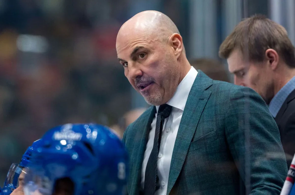 Nov 12, 2024; Vancouver, British Columbia, CAN; Vancouver Canucks head coach Rick Tocchet on the bench against the Calgary Flames during the second period at Rogers Arena. Mandatory Credit: Bob Frid-Imagn Images