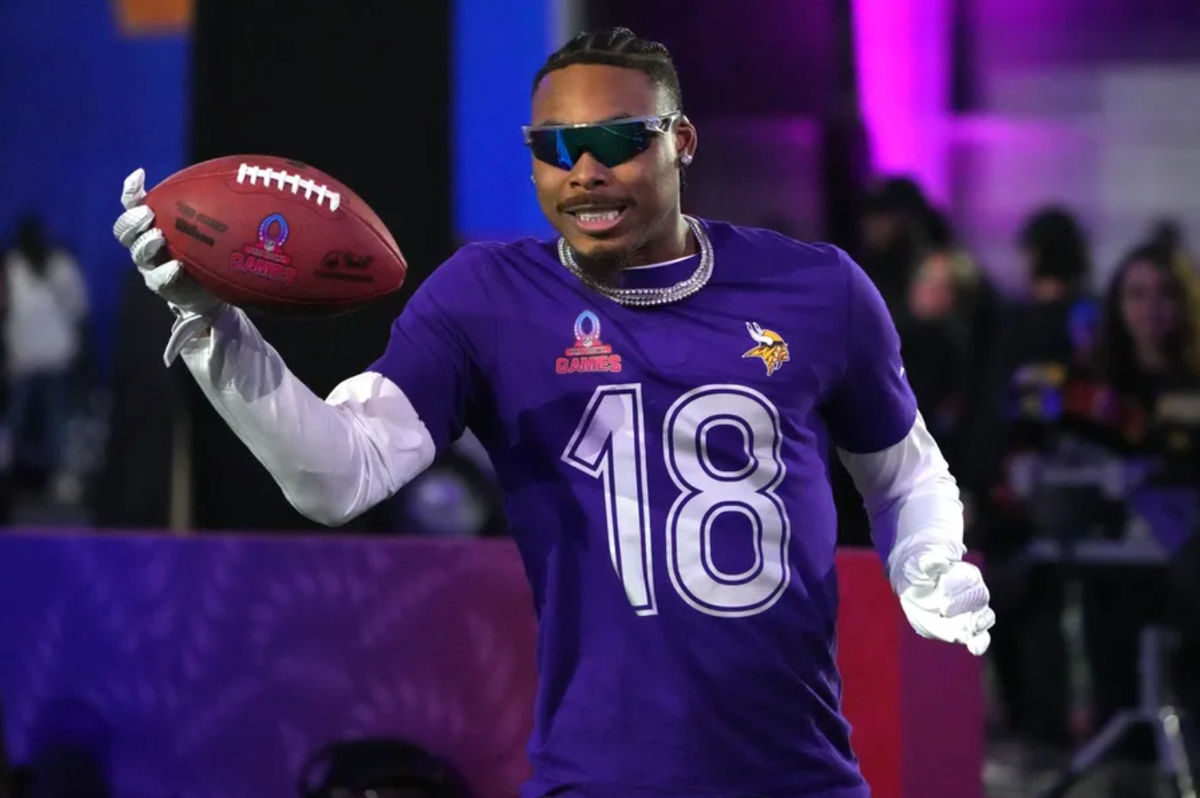 Jan 30, 2025; Orlando, FL, USA; NFC wide receiver Justin Jefferson of the Minnesota Vikings (18) catches the ball during the Satisfying Catch event at the Pro Bowl Skills Challenge at Nicholson Fieldhouse. Mandatory Credit: Kirby Lee-Imagn Images