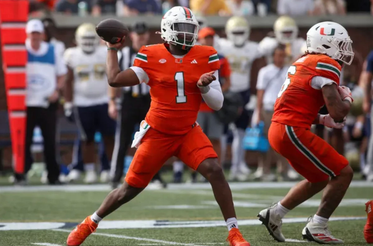 Nov 9, 2024; Atlanta, Georgia, USA; Miami Hurricanes quarterback Cam Ward (1) throws a pass against the Georgia Tech Yellow Jackets in the third quarter at Bobby Dodd Stadium at Hyundai Field. Mandatory Credit: Brett Davis-Imagn Images