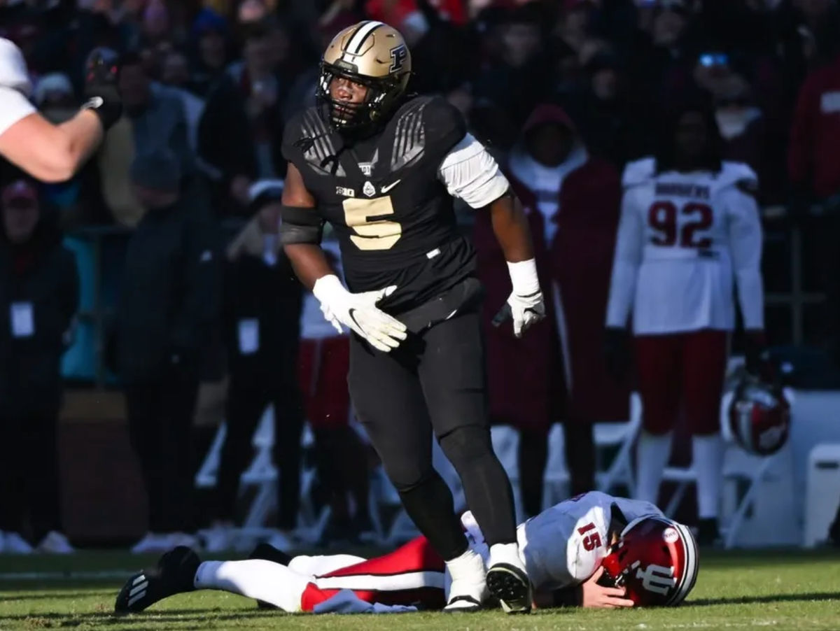 Nov 25, 2023; West Lafayette, Indiana, USA; Purdue Boilermakers linebacker Nic Scourton (5) reacts after bringing down Indiana Hoosiers quarterback Brendan Sorsby (15) during the second half at Ross-Ade Stadium. credits: Robert Goddin-USA TODAY Sports