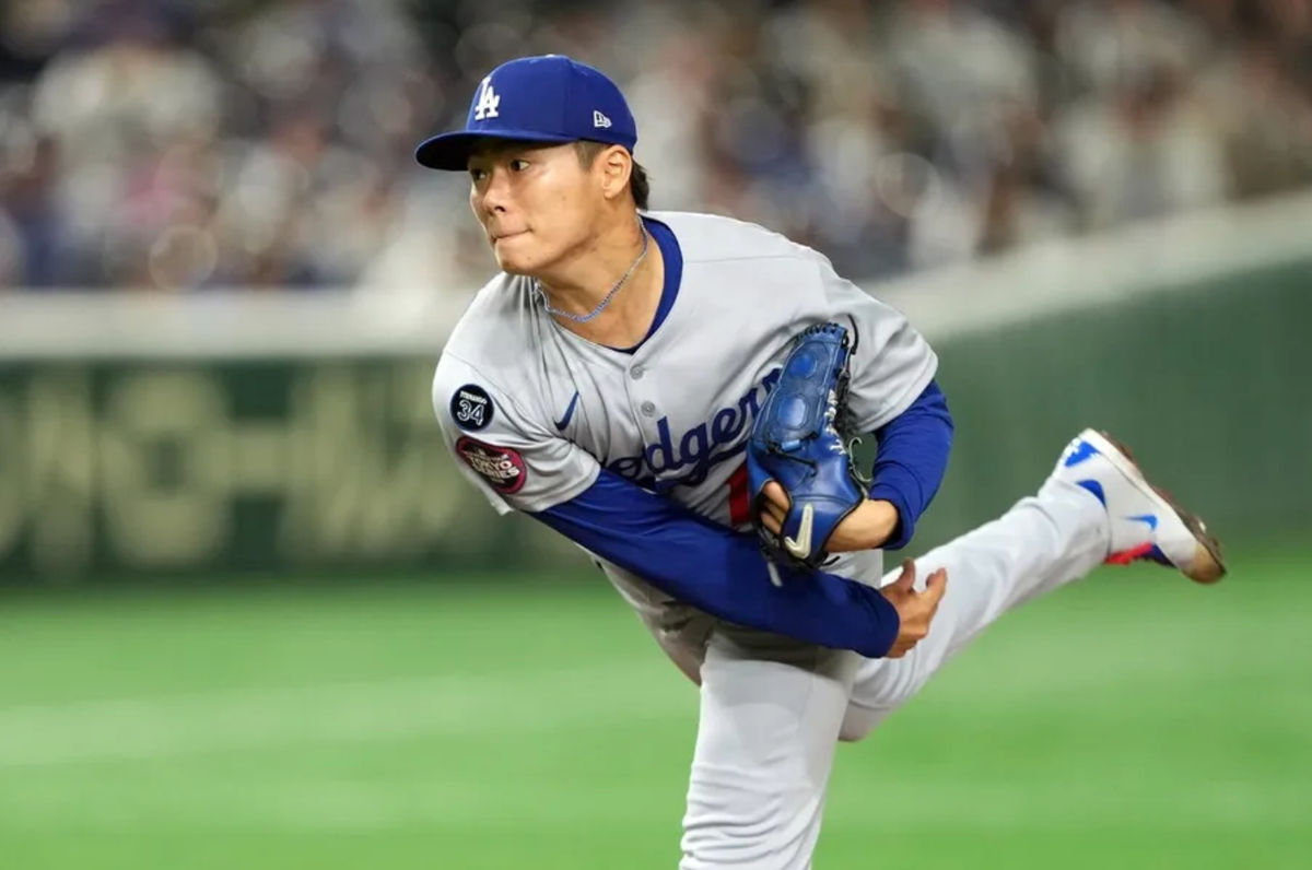 Mar 18, 2025; Bunkyo, Tokyo, JPN; Los Angeles Dodgers starting pitcher Yoshinobu Yamamoto (18) throws a pitch against the Chicago Cubs during the first inning during the Tokyo Series at Tokyo Dome. Mandatory Credit: Darren Yamashita-Imagn Images