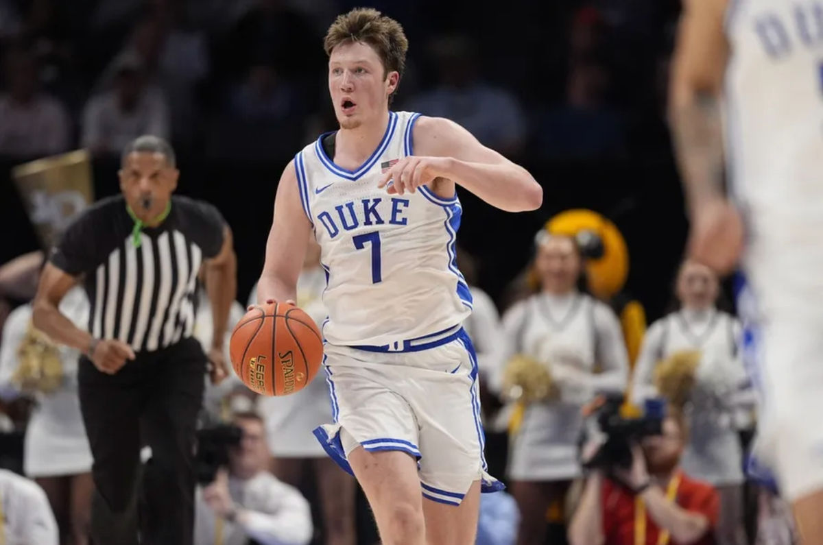 Mar 13, 2025; Charlotte, NC, USA; Duke Blue Devils guard Kon Knueppel (7) brings the ball up court against the Georgia Tech Yellow Jackets during the second half at Spectrum Center. Mandatory Credit: Jim Dedmon-Imagn Images