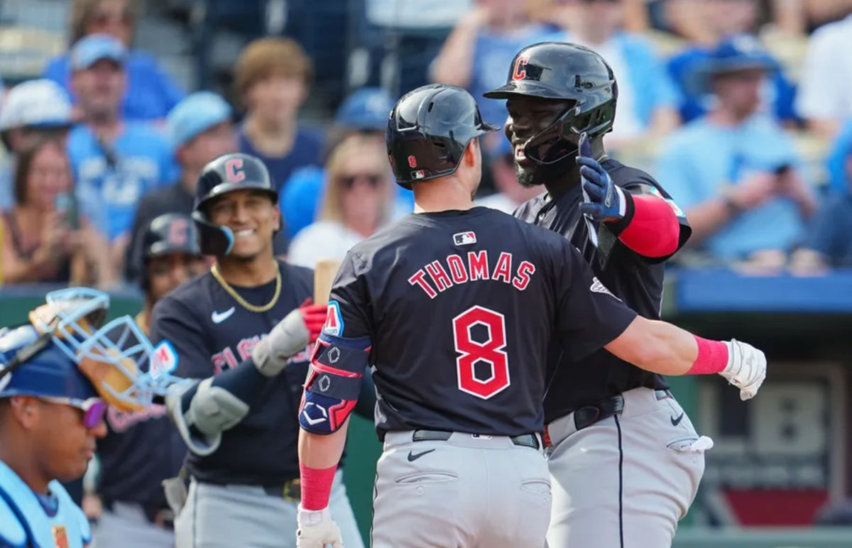 Sep 2, 2024; Kansas City, Missouri, USA; Cleveland Guardians center fielder Lane Thomas (8) is congratulated by right fielder Jhonkensy Noel (43) and shortstop Brayan Rocchio (4) after hitting a home run during the fifth inning against the Kansas City Royals at Kauffman Stadium. Mandatory Credit: Jay Biggerstaff-USA TODAY Sports
