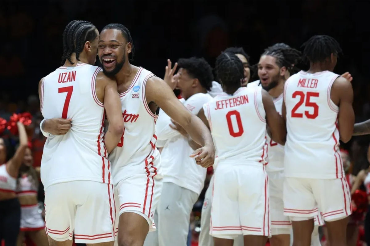 Mar 30, 2025; Indianapolis, IN, USA; Houston Cougars forward J'Wan Roberts (13) reacts with guard Milos Uzan (7) after the game against the Tennessee Volunteers in the Midwest Regional final of the 2025 NCAA tournament at Lucas Oil Stadium. Mandatory Credit: Trevor Ruszkowski-Imagn Images