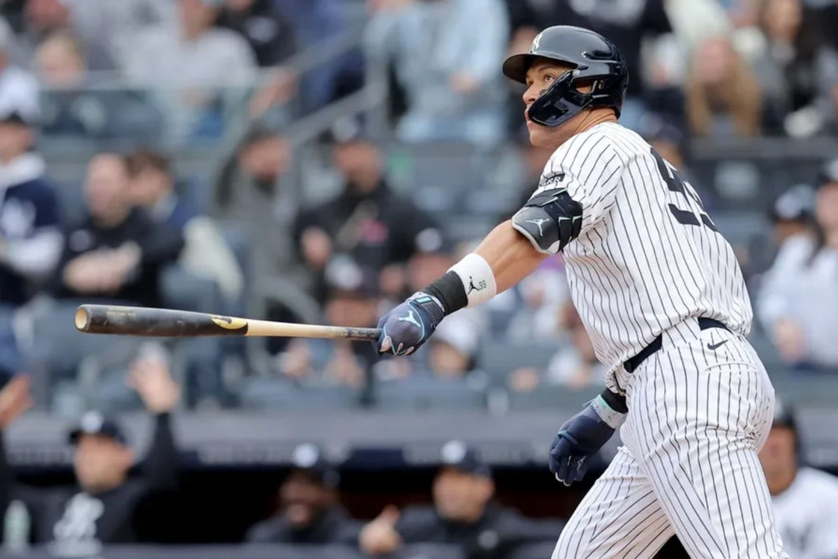Mar 30, 2025; Bronx, New York, USA; New York Yankees right fielder Aaron Judge (99) watches his two run home run against the Milwaukee Brewers during the first inning at Yankee Stadium. Mandatory Credit: Brad Penner-Imagn Images