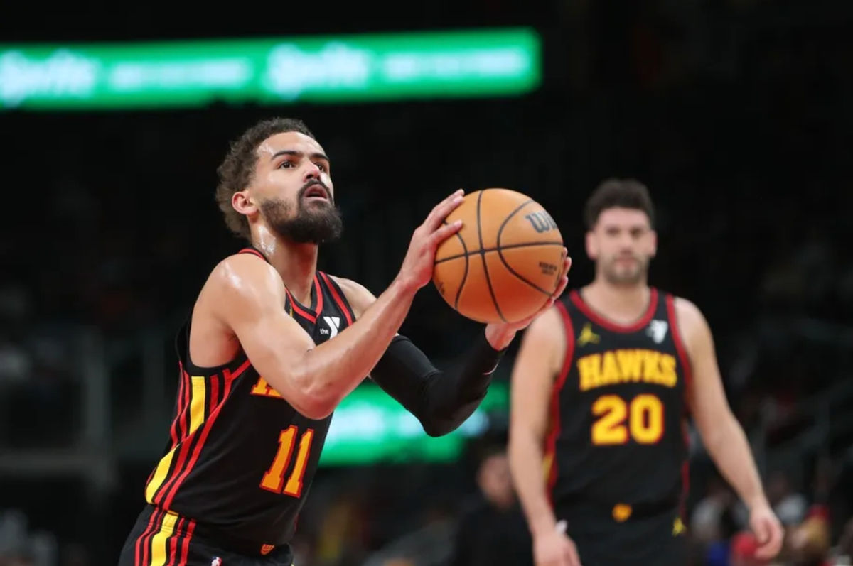 Mar 12, 2025; Atlanta, Georgia, USA; Atlanta Hawks guard Trae Young (11) shoots at the line against the Charlotte Hornets during the first quarter at State Farm Arena. Mandatory Credit: Mady Mertens-Imagn Images