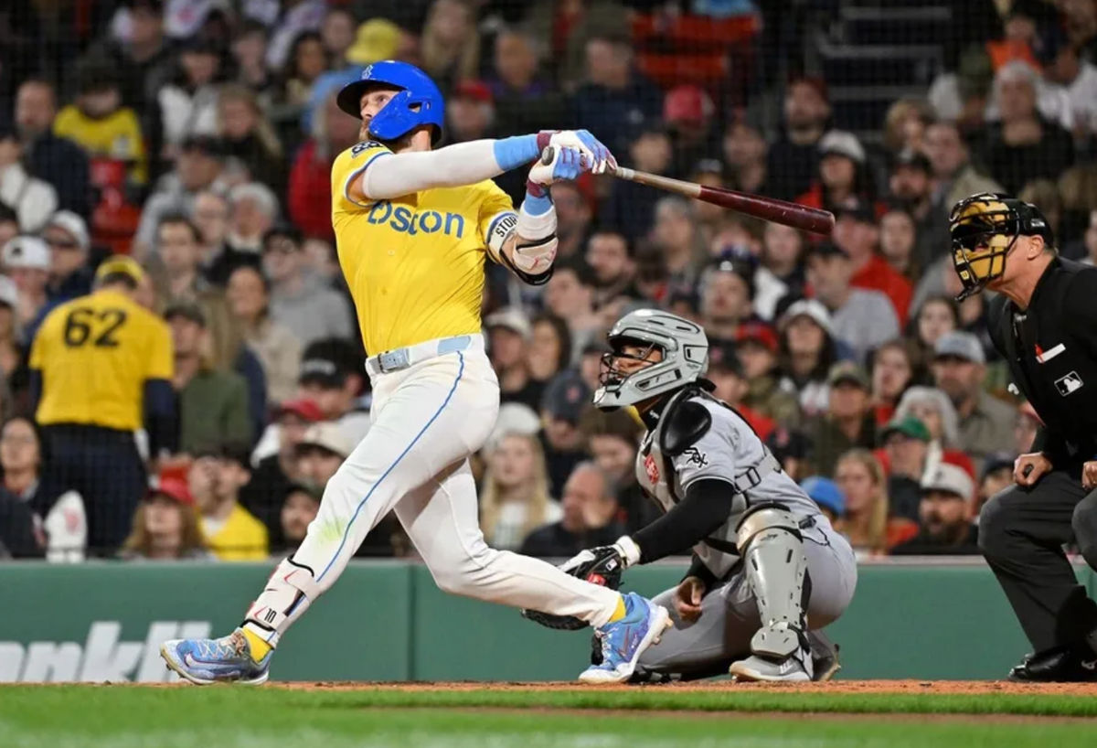 Apr 18, 2025; Boston, Massachusetts, USA; Boston Red Sox shortstop Trevor Story (10) hits a two-run home run against the Chicago White Sox during the seventh inning at Fenway Park. Mandatory Credit: Eric Canha-Imagn Images