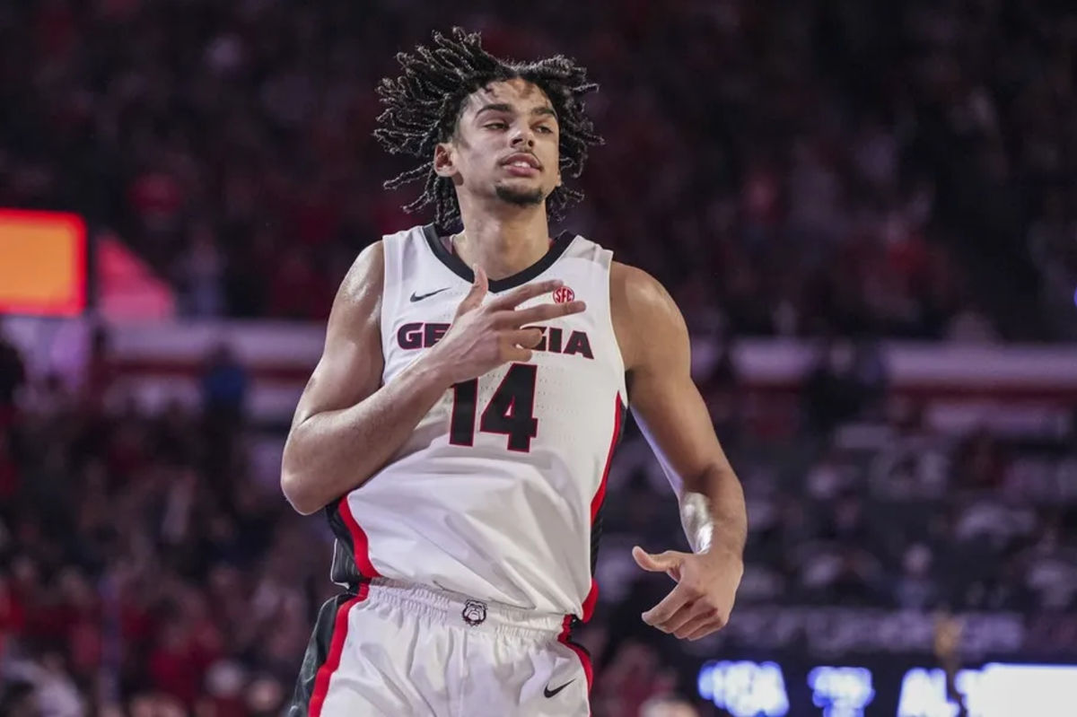 Jan 18, 2025; Athens, Georgia, USA; Georgia Bulldogs forward Asa Newell (14) reacts after making a three point shot against the Auburn Tigers at Stegeman Coliseum. Mandatory Credit: Dale Zanine-Imagn Images
