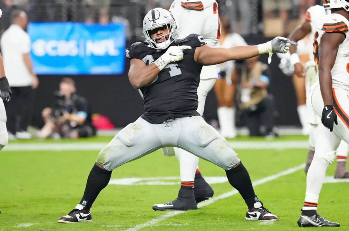 Sep 29, 2024; Paradise, Nevada, USA; Las Vegas Raiders defensive tackle Christian Wilkins (94) celebrates after a penalty overturned a scoring play by the Cleveland Browns during the fourth quarter at Allegiant Stadium. Mandatory Credit: Stephen R. Sylvanie-Imagn Images