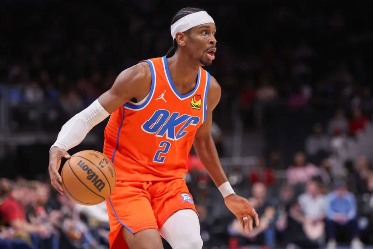 Feb 28, 2025; Atlanta, Georgia, USA; Oklahoma City Thunder guard Shai Gilgeous-Alexander (2) dribbles against the Atlanta Hawks in the first quarter at State Farm Arena. Mandatory Credit: Brett Davis-Imagn Images