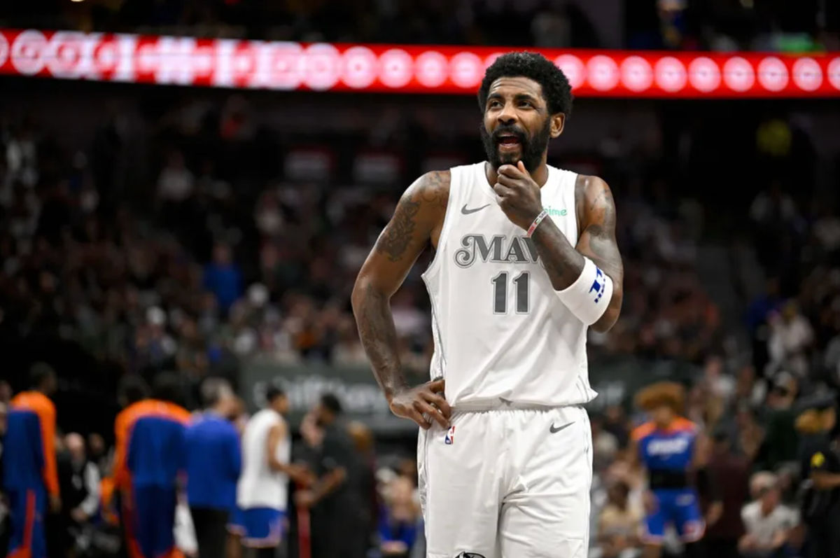 Nov 27, 2024; Dallas, Texas, USA; Dallas Mavericks guard Kyrie Irving (11) walks back up the court during the first quarter against the New York Knicks at the American Airlines Center. Mandatory Credit: Jerome Miron-Imagn Images