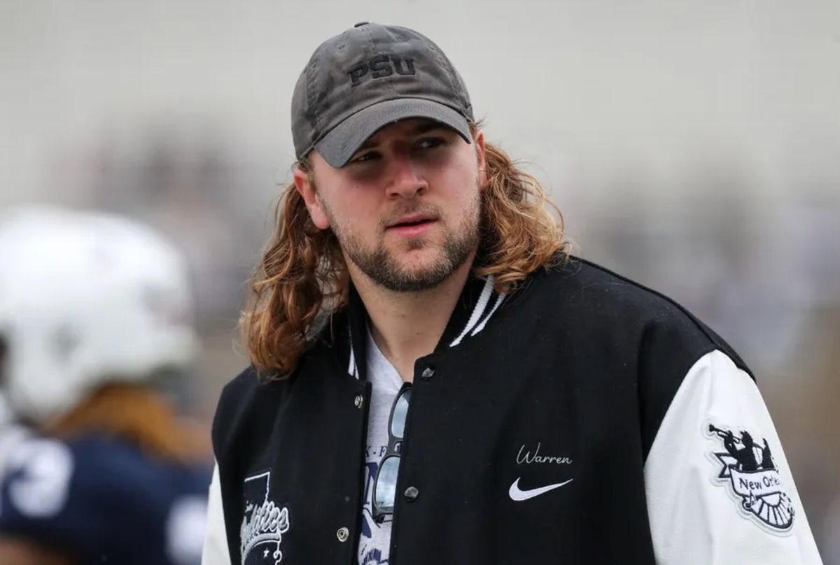 Apr 26, 2025; University Park, PA, USA; Former Penn State Nittany Lions tight end Tyler Warren walks on the sideline prior to the Blue White spring game at Beaver Stadium. Mandatory Credit: Matthew O'Haren-Imagn Images