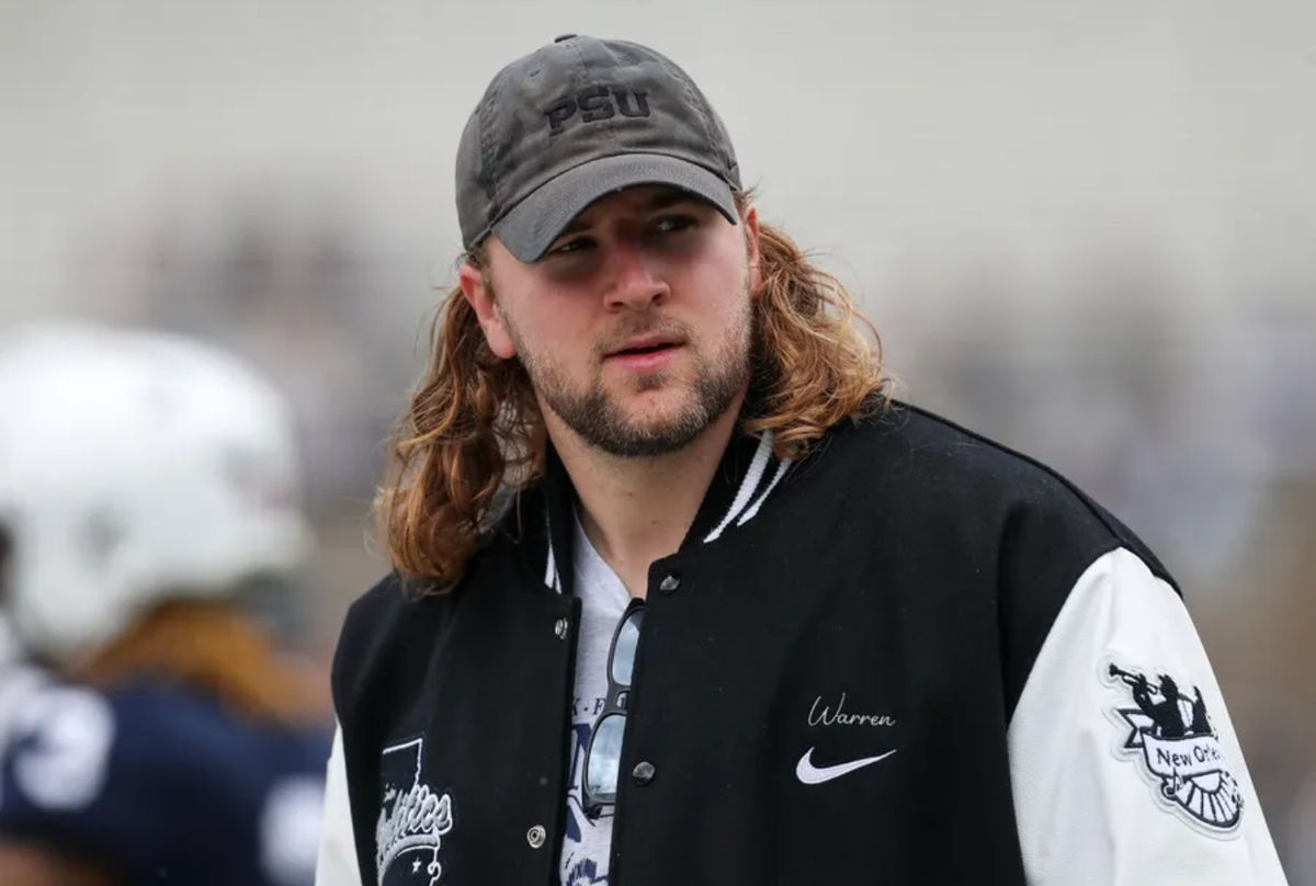 Apr 26, 2025; University Park, PA, USA; Former Penn State Nittany Lions tight end Tyler Warren walks on the sideline prior to the Blue White spring game at Beaver Stadium. Mandatory Credit: Matthew O'Haren-Imagn Images