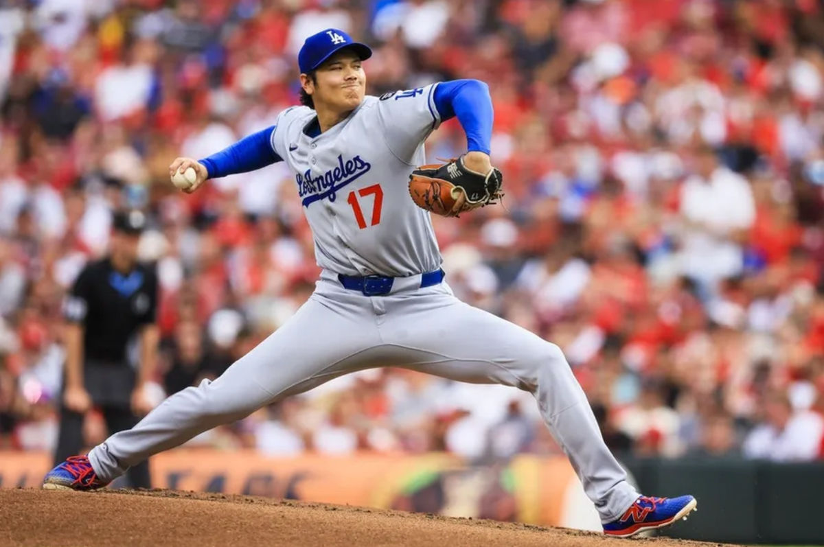 Jul 30, 2025; Cincinnati, Ohio, USA; Los Angeles Dodgers starting pitcher Shohei Ohtani (17) pitches against the Cincinnati Reds in the second inning at Great American Ball Park. Mandatory Credit: Katie Stratman-Imagn Images