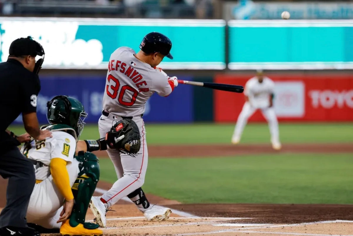 Sep 9, 2025; West Sacramento, California, USA; Boston Red Sox designated hitter Rob Refsnyder (30) hits a three run home run during the first inning against the Athletics at Sutter Health Park. Mandatory Credit: Sergio Estrada-Imagn Images