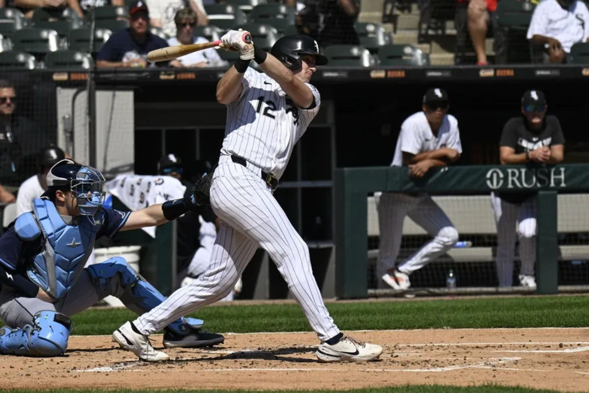 Sep 11, 2025; Chicago, Illinois, USA; Chicago White Sox shortstop Colson Montgomery (12) hits a two-RBI single against the Tampa Bay Rays during the first inning at Rate Field. Mandatory Credit: Matt Marton-Imagn Images