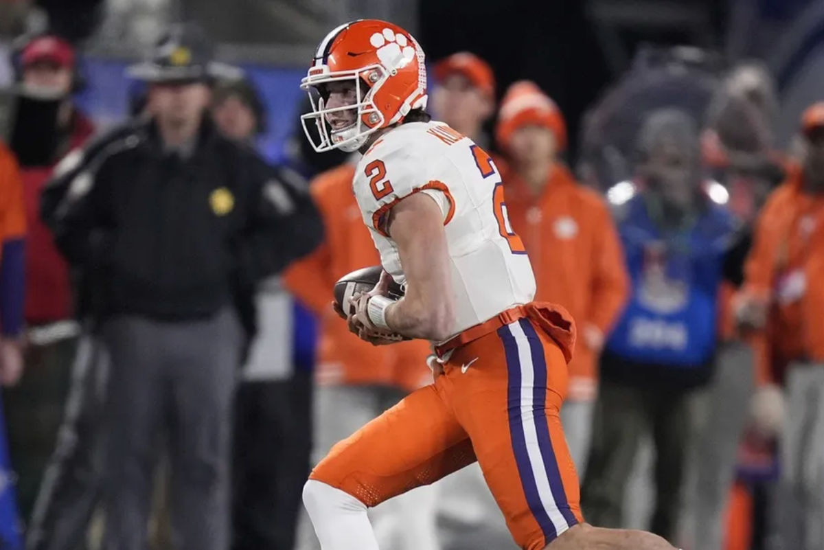 Dec 7, 2024; Charlotte, NC, USA; Clemson Tigers quarterback Cade Klubnik (2) runs during the second quarter against the Southern Methodist Mustangs in the 2024 ACC Championship game at Bank of America Stadium. Mandatory Credit: Jim Dedmon-Imagn Images
